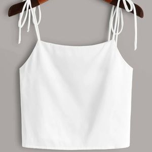 White crop top tied from the shoulders